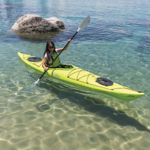a person riding a surf board on a body of water